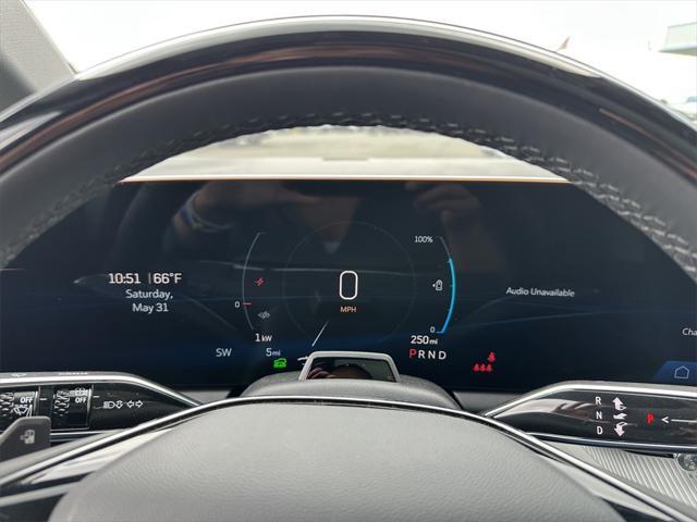 Photo of 2025 Monarch Orange Cadillac OPTIQ