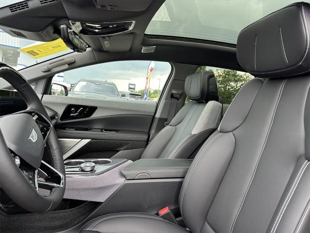 Photo of 2025 Monarch Orange Cadillac OPTIQ