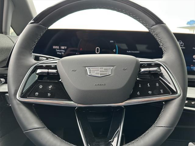 Photo of 2025 Monarch Orange Cadillac OPTIQ