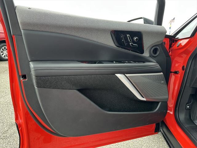 Photo of 2025 Monarch Orange Cadillac OPTIQ