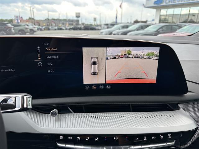 Photo of 2025 Monarch Orange Cadillac OPTIQ