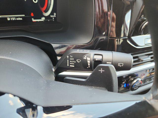 Photo of 2025 Scarlet Ember Tintcoat Nissan Pathfinder