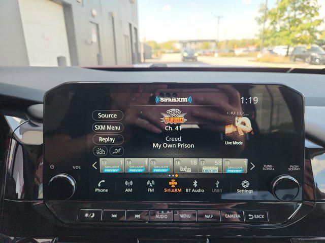 Photo of 2025 Scarlet Ember Tintcoat Nissan Pathfinder