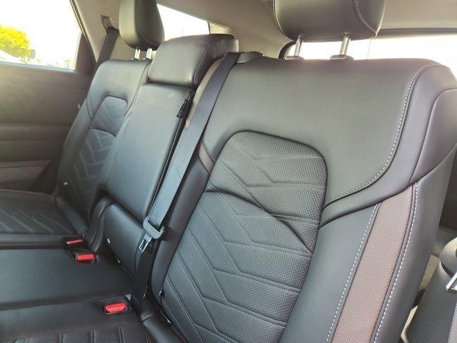 Photo of 2025 Scarlet Ember Tintcoat Nissan Pathfinder