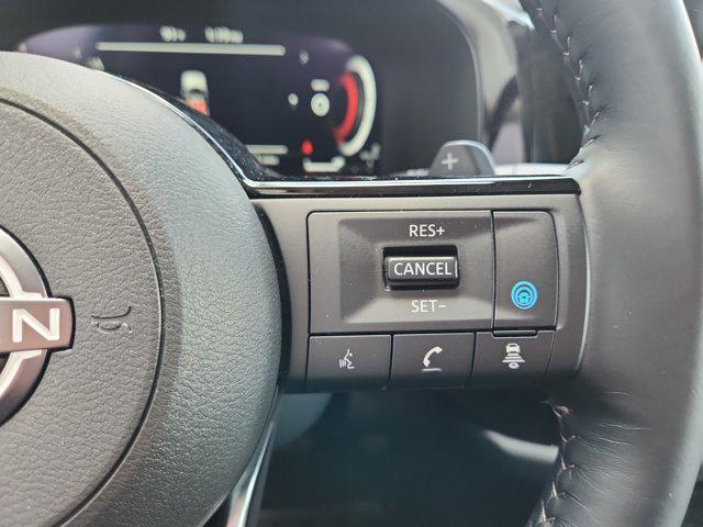 Photo of 2025 Scarlet Ember Tintcoat Nissan Pathfinder