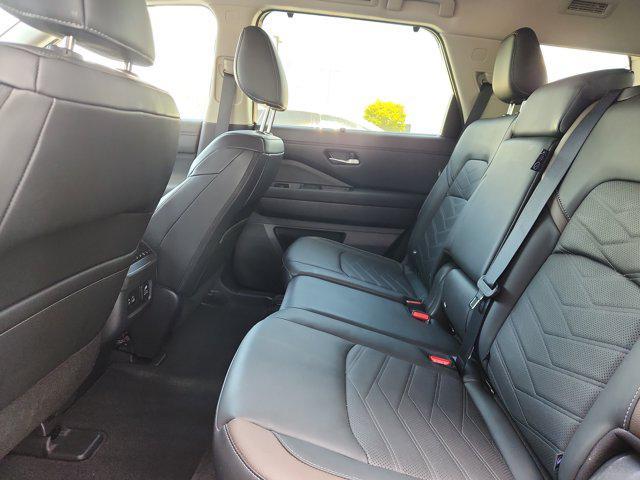 Photo of 2025 Scarlet Ember Tintcoat Nissan Pathfinder
