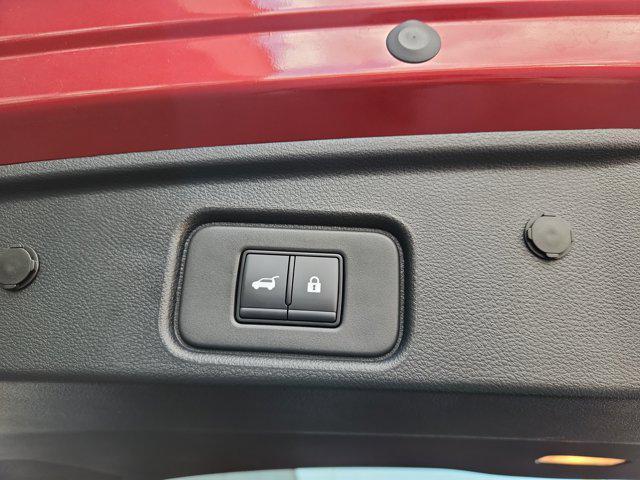Photo of 2025 Scarlet Ember Tintcoat Nissan Pathfinder