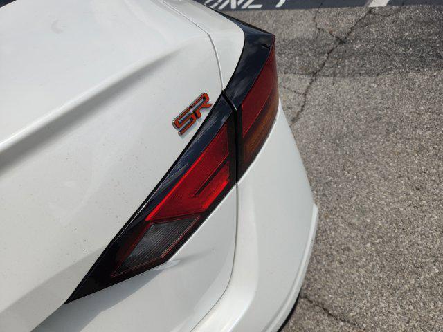 Photo of 2025 Pearl White Tricoat Nissan Altima