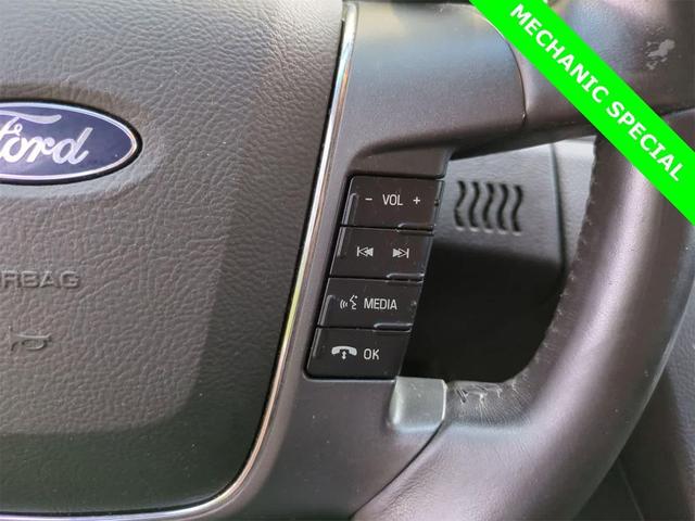 Photo of 2012 Tuxedo Black Metallic Ford Taurus