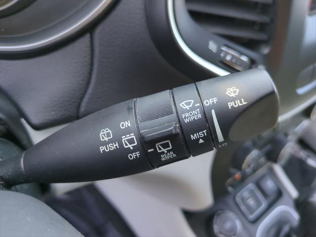 Photo of 2021 Light Brownstone Pearlcoat Jeep Cherokee