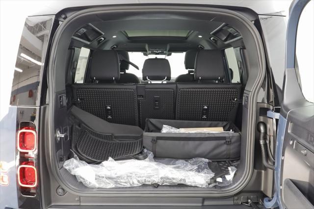 Photo of 2025 Tasman Blue Metallic Land Rover Defender