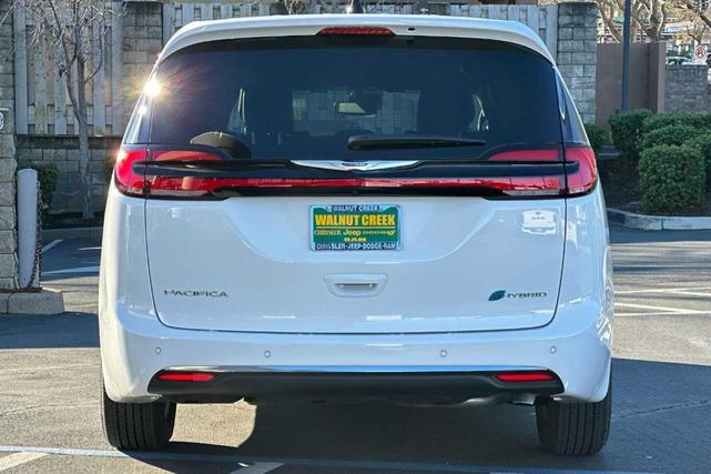 Photo of 2025 Bright White Chrysler Pacifica Hybrid