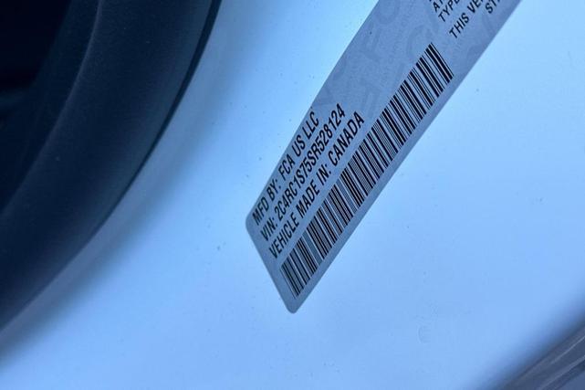 Photo of 2025 Bright White Chrysler Pacifica Hybrid