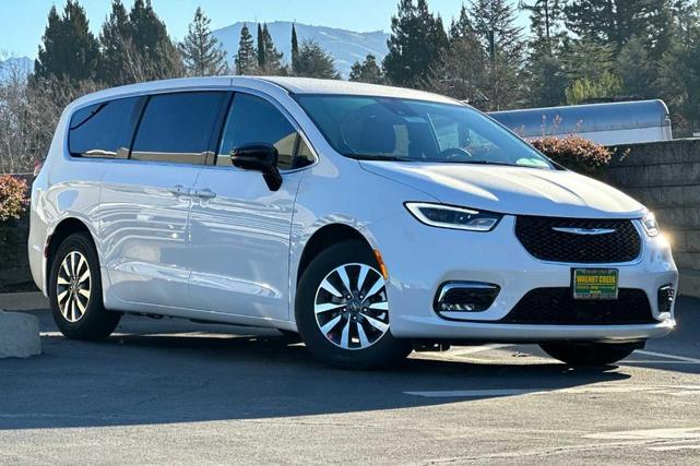 Photo of 2025 Bright White Chrysler Pacifica Hybrid