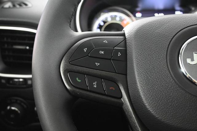 Photo of 2021 Bright White Clearcoat Jeep Cherokee