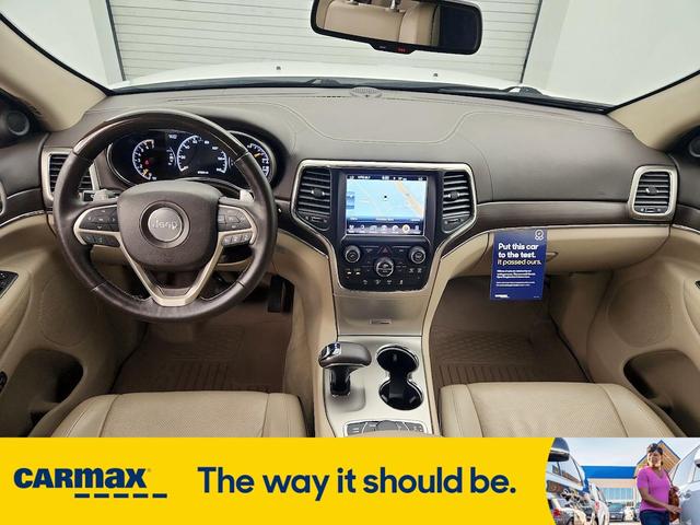 Photo of 2015 White Jeep Grand Cherokee