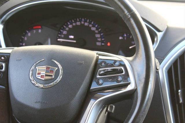 Photo of 2015 Black Raven Cadillac SRX