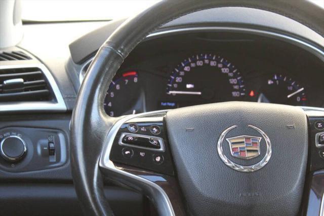 Photo of 2015 Black Raven Cadillac SRX