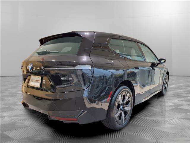 Photo of 2025 Black Sapphire Metallic BMW iX