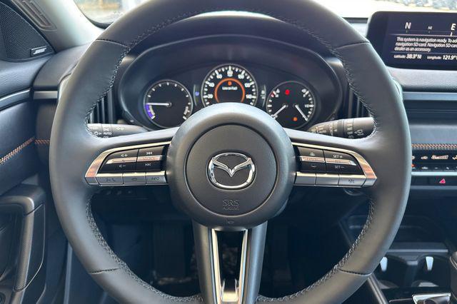 Photo of 2025 Jet Black Mica Mazda CX-50 Hybrid
