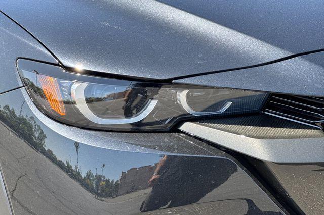 Photo of 2025 Jet Black Mica Mazda CX-50 Hybrid