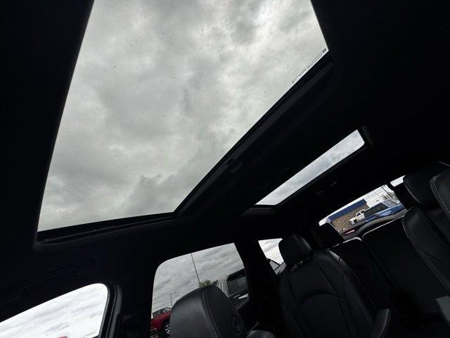Photo of 2023 Cherry Red Tintcoat Buick Enclave