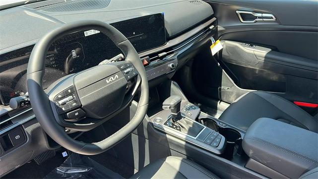Photo of 2026 White Pearl Kia Sportage