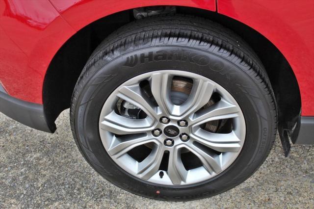 Photo of 2024 Rapid Red Metallic Tinted Clearcoat Ford Edge