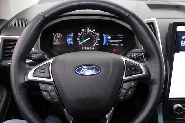 Photo of 2024 Rapid Red Metallic Tinted Clearcoat Ford Edge