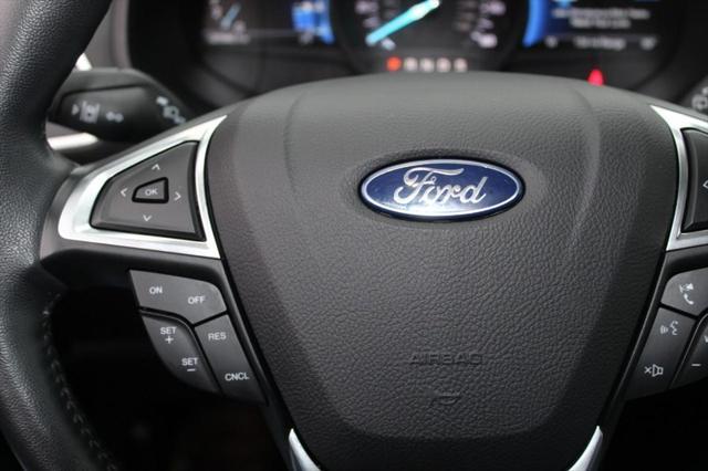 Photo of 2024 Rapid Red Metallic Tinted Clearcoat Ford Edge