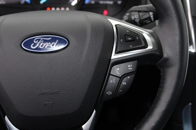 Photo of 2024 Rapid Red Metallic Tinted Clearcoat Ford Edge