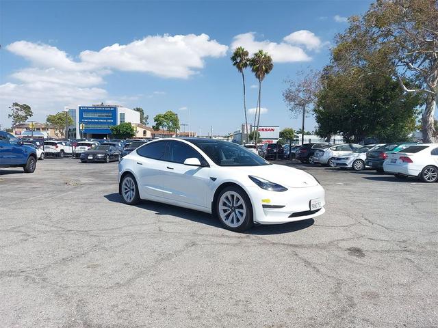 Photo of 2022 Pearl White Multi-Coat Tesla Model 3