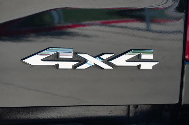 Photo of 2024 Diamond Black Crystal Pearlcoat RAM 2500