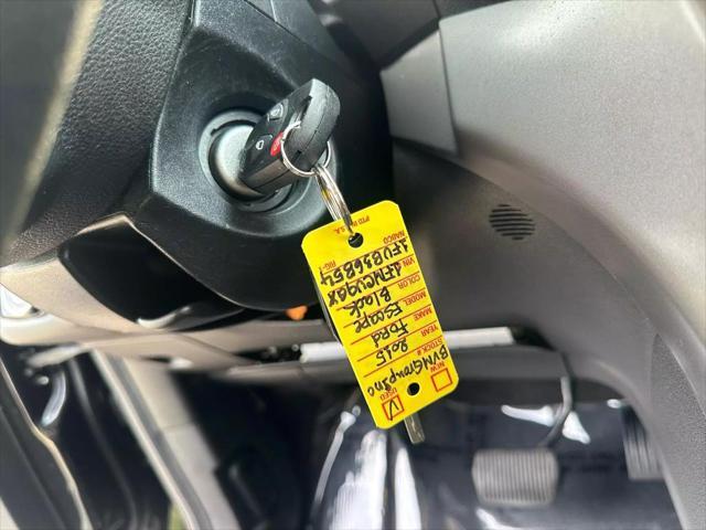 Photo of 2015 Tuxedo Black Ford Escape