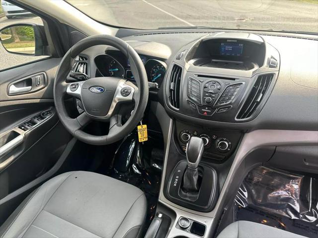 Photo of 2015 Tuxedo Black Ford Escape