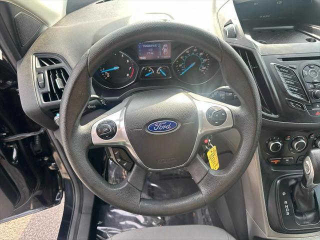Photo of 2015 Tuxedo Black Ford Escape