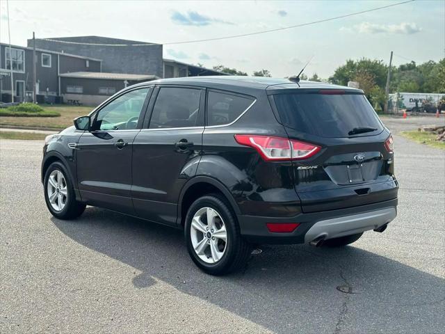 Photo of 2015 Tuxedo Black Ford Escape