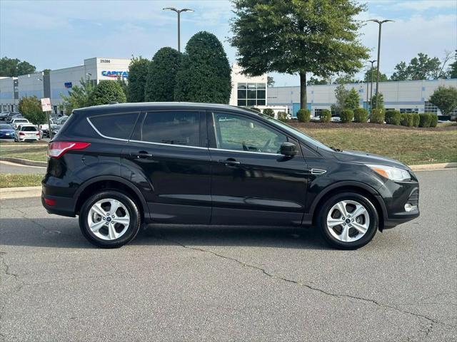 Photo of 2015 Tuxedo Black Ford Escape