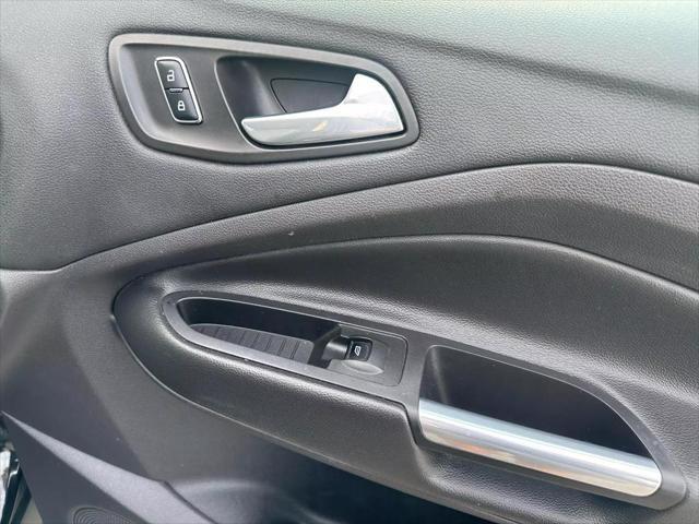 Photo of 2015 Tuxedo Black Ford Escape