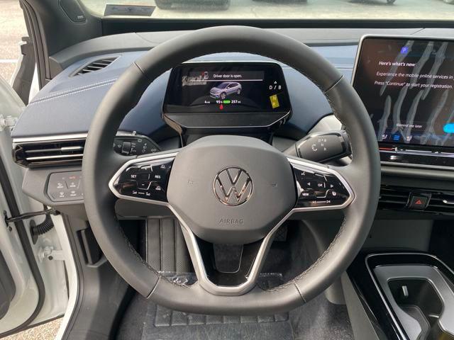 Photo of 2025 Opal White w/Black Roof Volkswagen ID.4