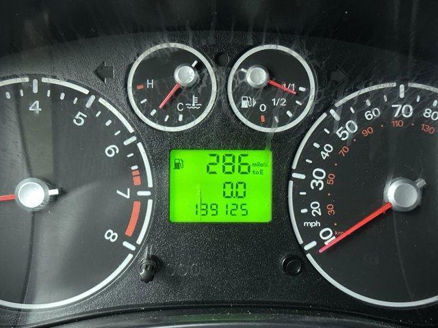 Photo of 2013 Frozen White Ford Transit Connect