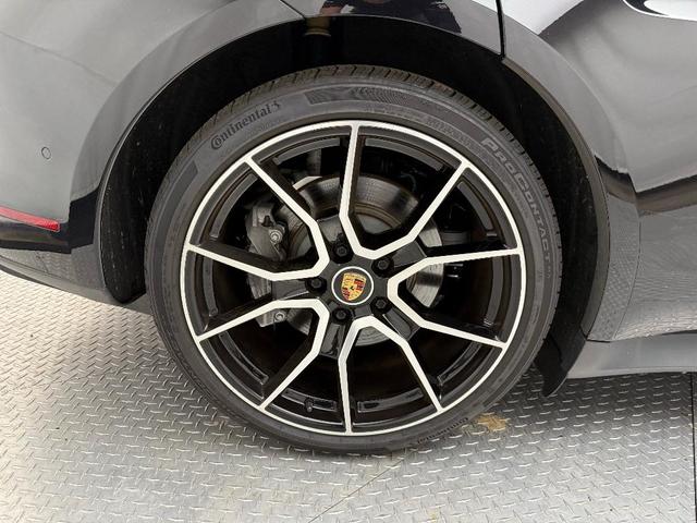 Photo of 2023 Jet Black Metallic Porsche Taycan