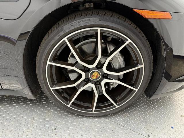 Photo of 2023 Jet Black Metallic Porsche Taycan