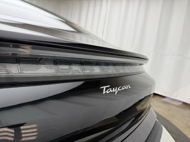 Photo of 2023 Jet Black Metallic Porsche Taycan