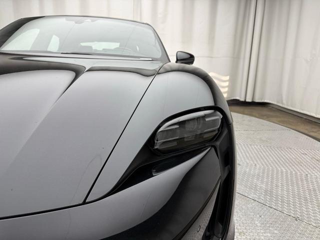 Photo of 2023 Jet Black Metallic Porsche Taycan