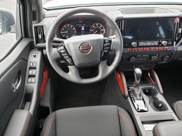 Photo of 2025 Glacier White Nissan Frontier