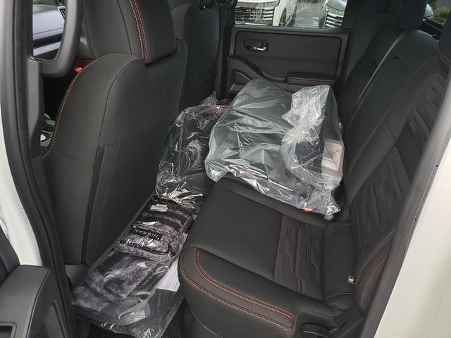 Photo of 2025 Glacier White Nissan Frontier