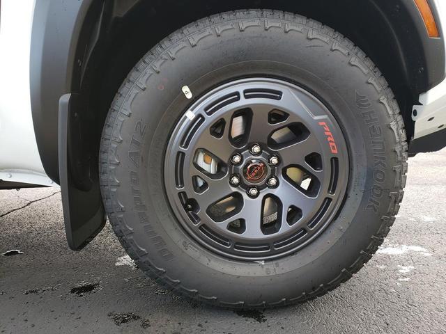 Photo of 2025 Glacier White Nissan Frontier