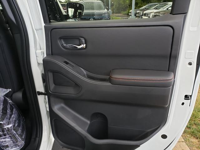 Photo of 2025 Glacier White Nissan Frontier