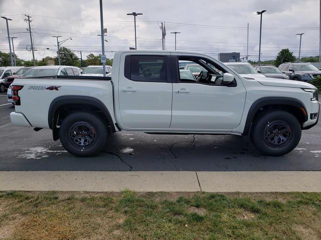 Photo of 2025 Glacier White Nissan Frontier